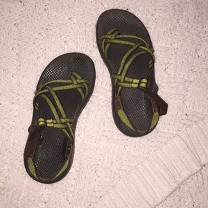 Green and brown women’s chacos